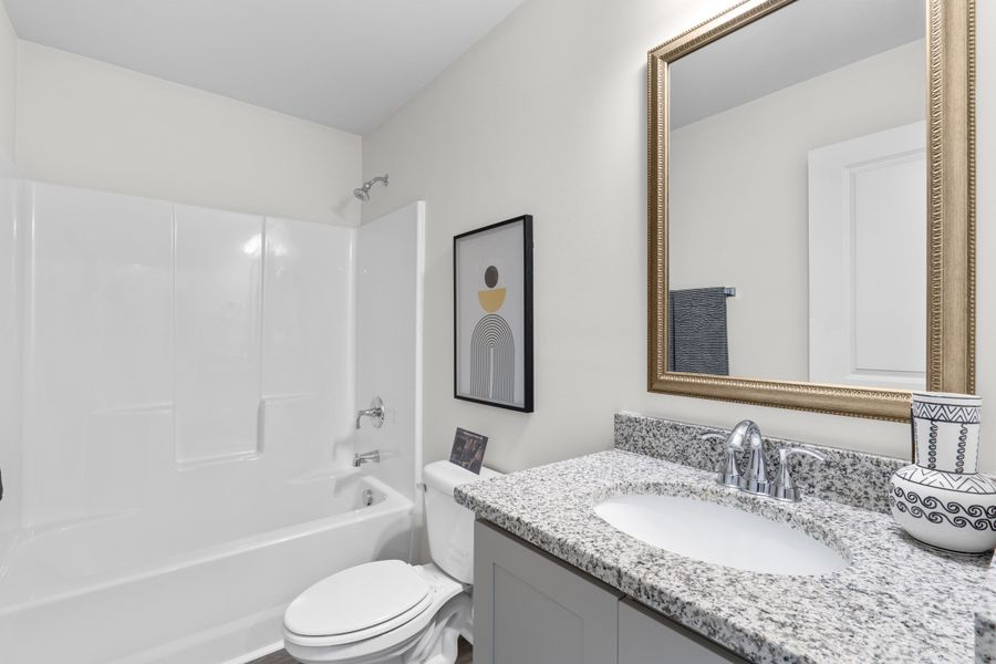 Representative furnished interior of a home built from the Spruce B by McGuinn Homes in Ashton Lakes, Lexington (Image 28).