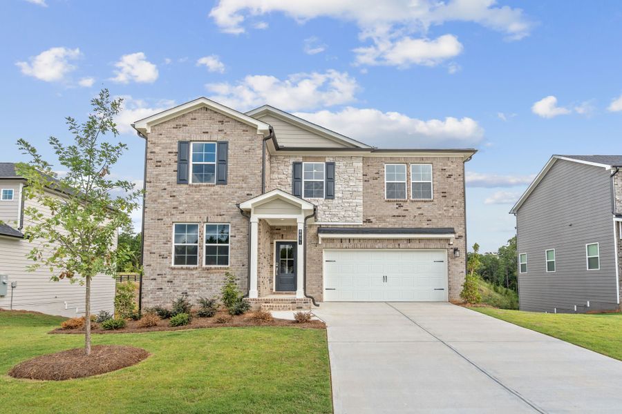 Front exterior of a new home in Belleview Manor, Fairburn, GA, highlighting curb appeal (Image 1). Front exterior of a new home in Belleview Manor, Fairburn, GA, highlighting curb appeal (Image 1).