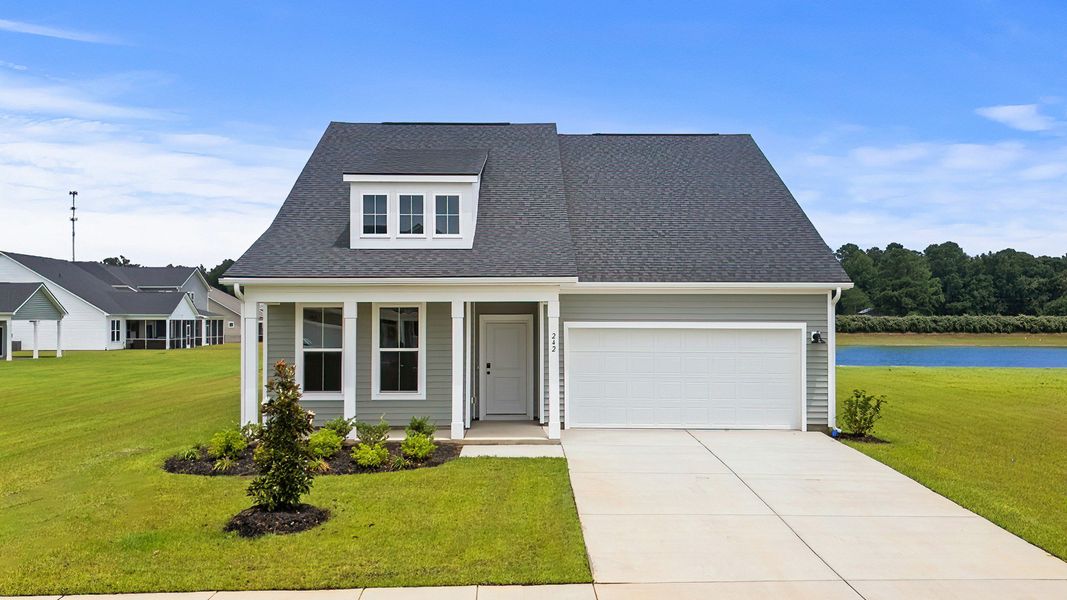 Representative exterior photo of a completed home built from the Chelsea by DRB Homes in Bluffs at Sun Colony, Longs, SC (Image 2).