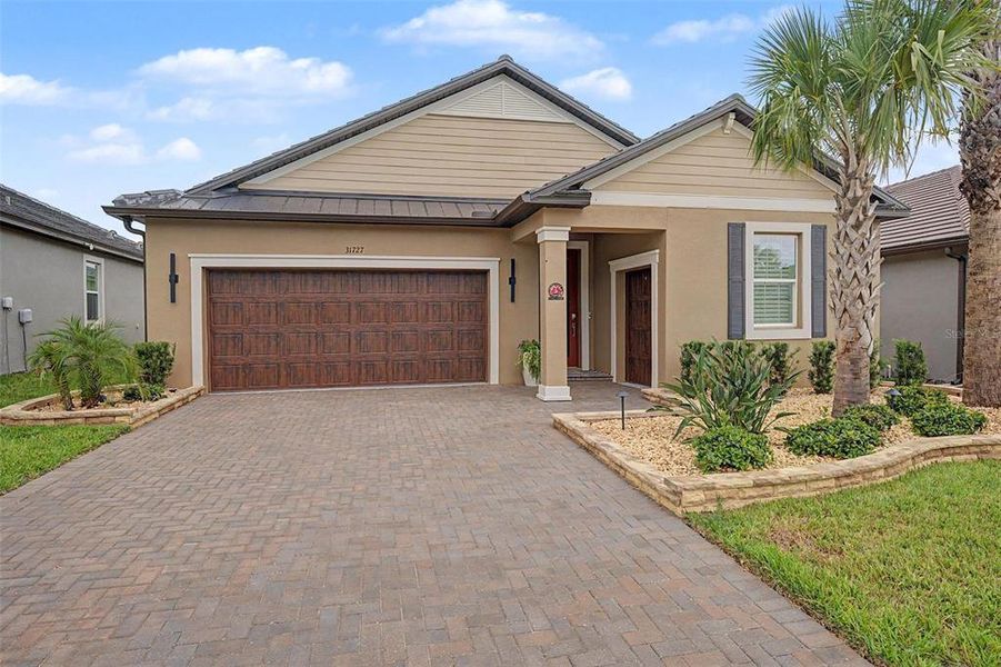 Front exterior of a new home in Mirada Active Adult, San Antonio, FL, highlighting curb appeal (Image 25). Front exterior of a new home in Mirada Active Adult, San Antonio, FL, highlighting curb appeal (Image 25).