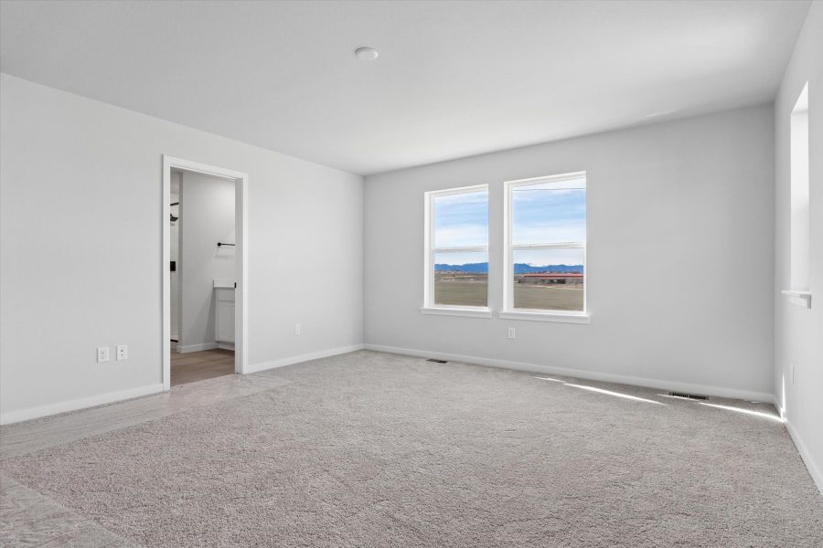 A room with a window and a door. A room with a window and a door.