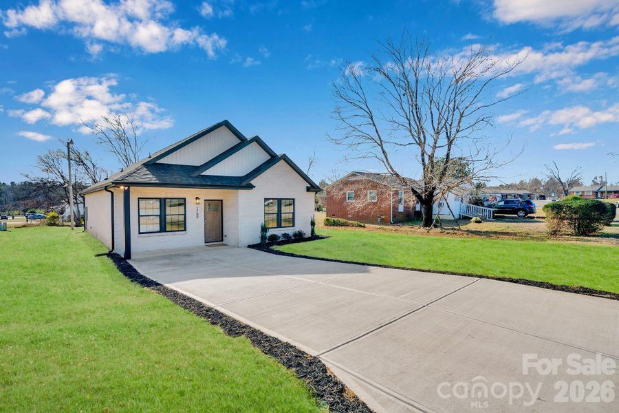 Front exterior of a new home in , Rock Hill, SC, highlighting curb appeal (Image 24).