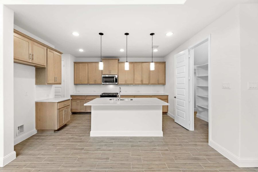 Representative furnished interior of a home built from the Willow by UnionMain Homes in Edgewater, Fate (Image 8).