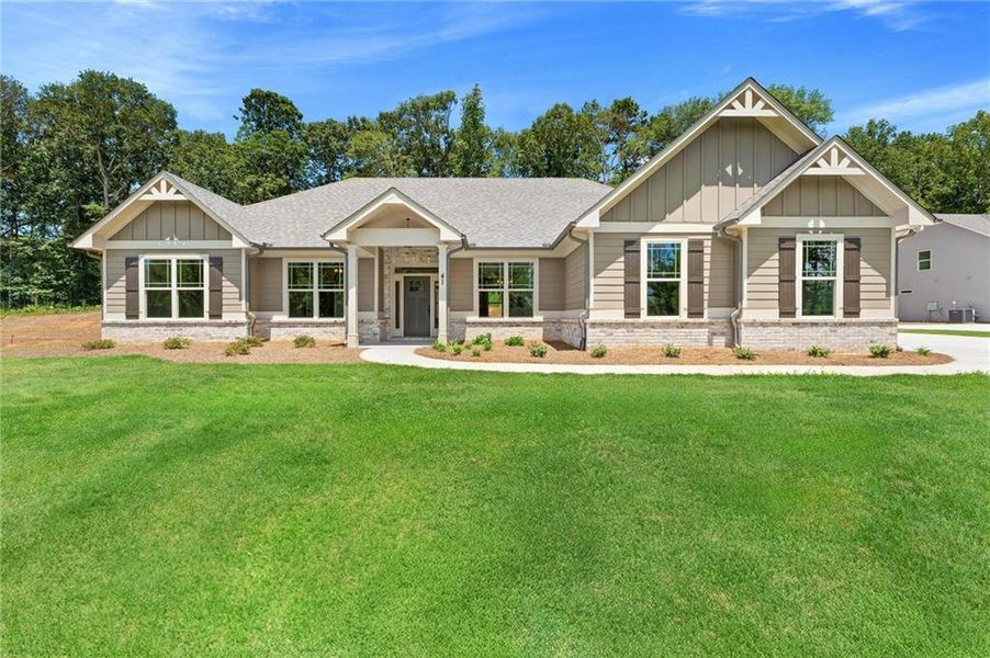 Front exterior of a new home in , Jefferson, GA, highlighting curb appeal (Image 1).