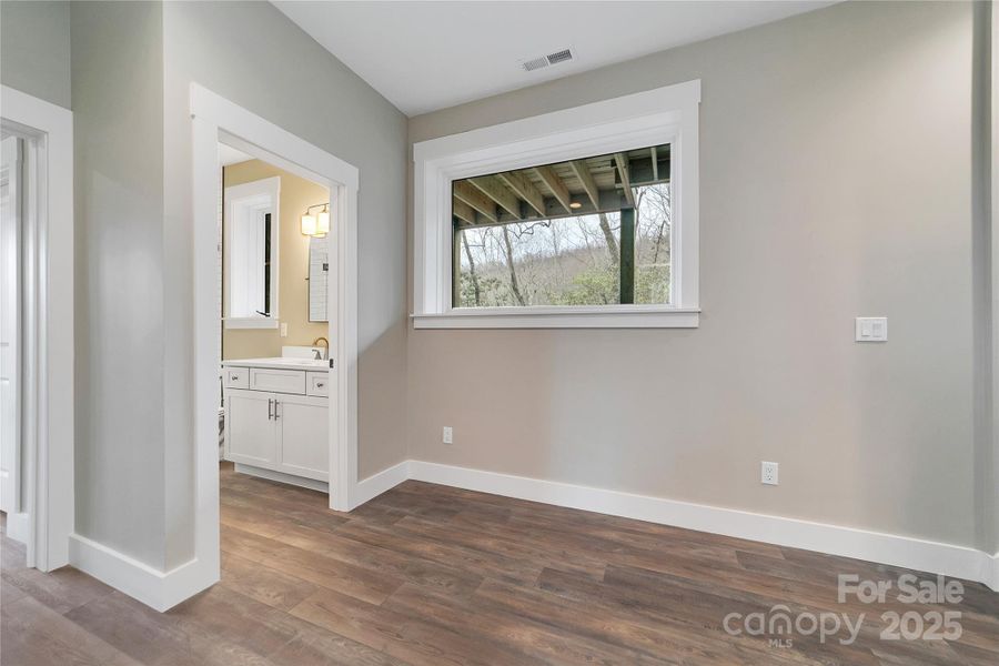Spacious, unfurnished interior of a new home in , Pisgah Forest (Image 18).