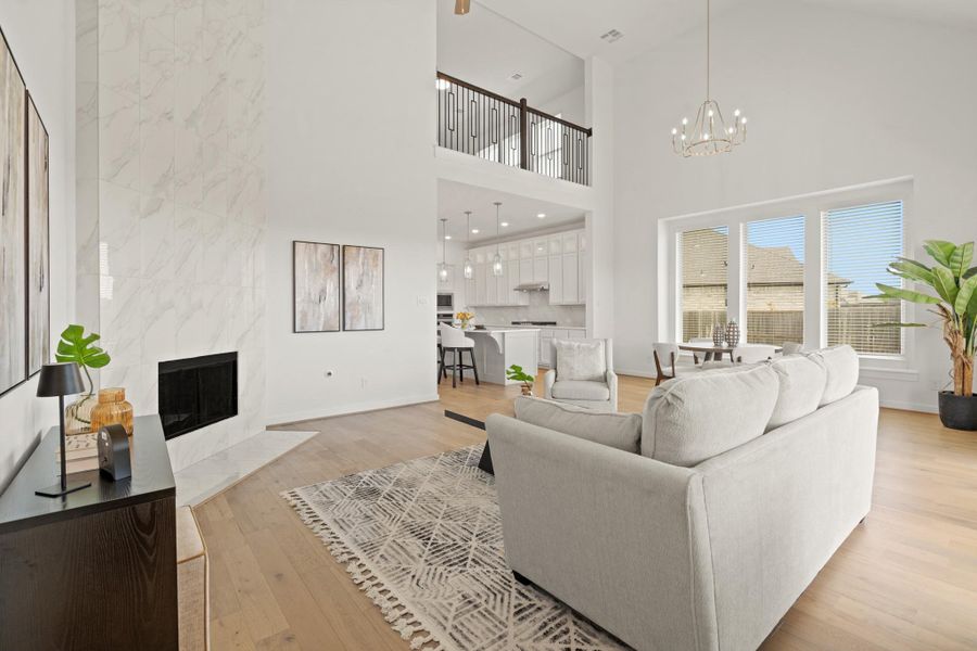 The open flow connects effortlessly to the kitchen and dining areas, making it ideal for those who appreciate refined, modern living with a timeless touch. Thoughtfully designed with style and comfort in mind, this home is a true retreat!