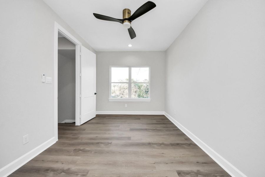 3rd floor bedroom with ensuite bathroom.