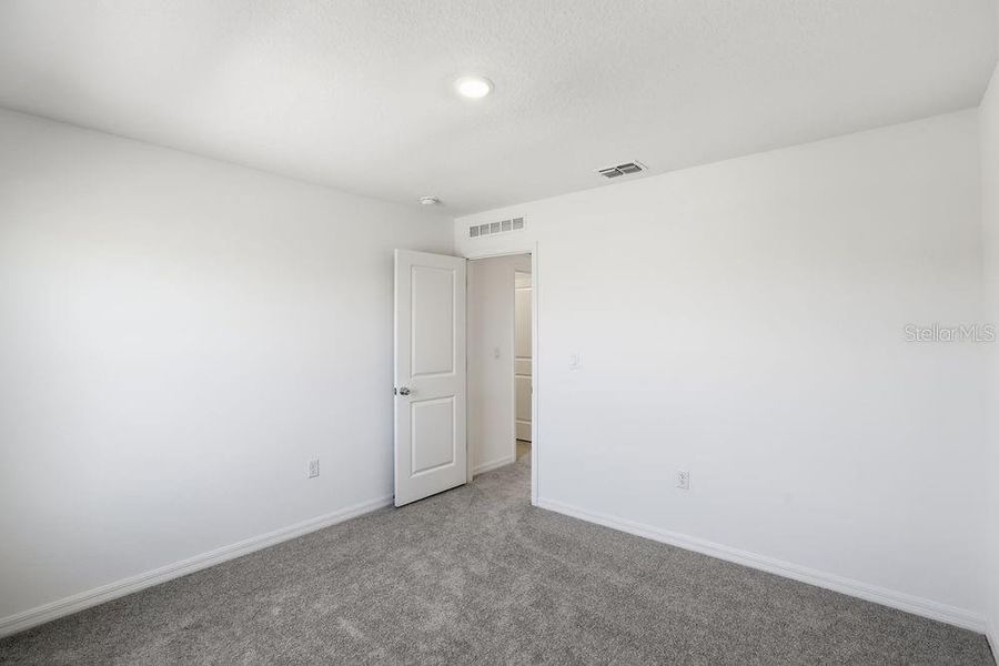 Spacious, unfurnished interior of a new home in Waterstone, Groveland (Image 33). Spacious, unfurnished interior of a new home in Waterstone, Groveland (Image 33).