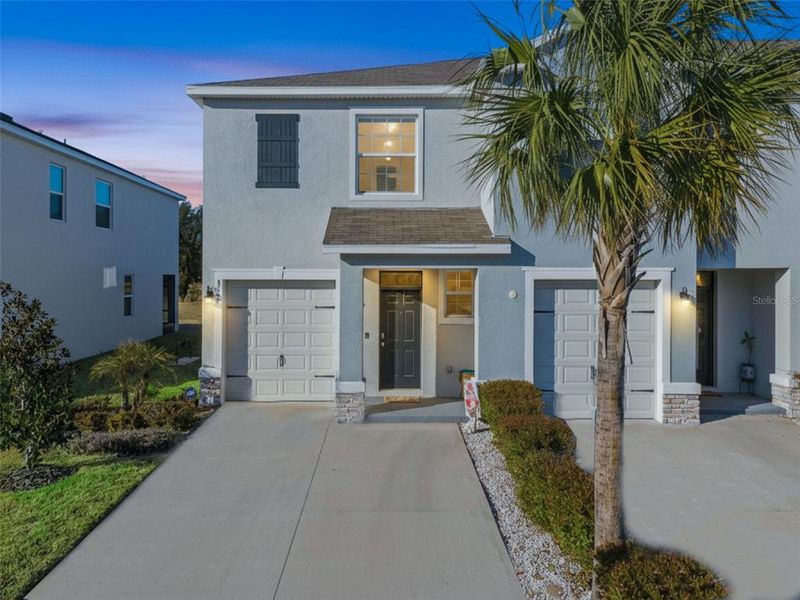 Front exterior of a new home in , Plant City, FL, highlighting curb appeal (Image 2). Front exterior of a new home in , Plant City, FL, highlighting curb appeal (Image 2).