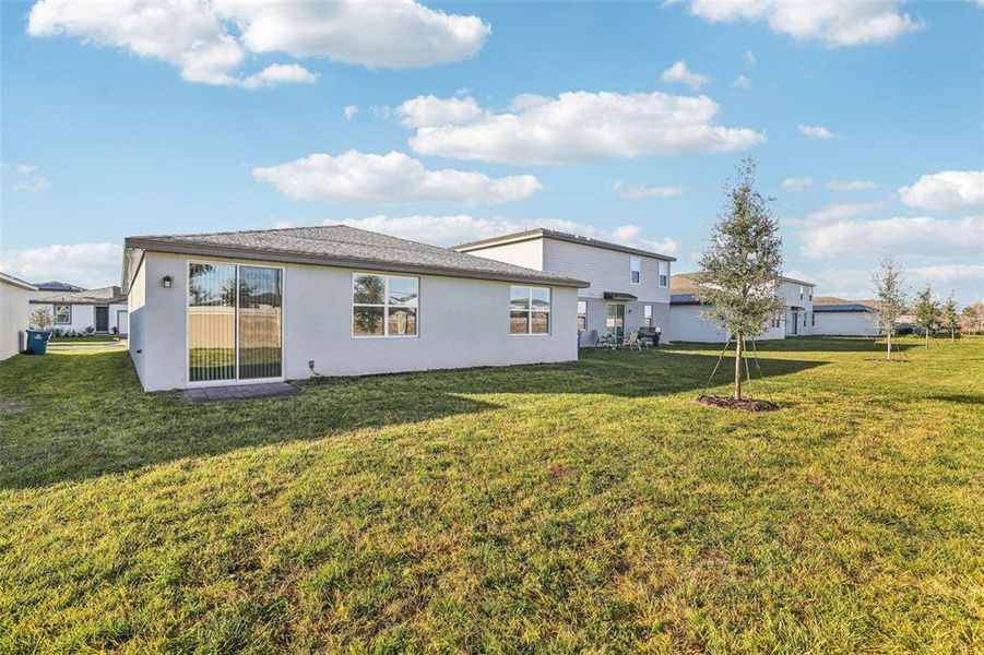Exterior details and patio area of a home in Lawson Dunes - Signature Series, Haines City (Image 27). Exterior details and patio area of a home in Lawson Dunes - Signature Series, Haines City (Image 27).