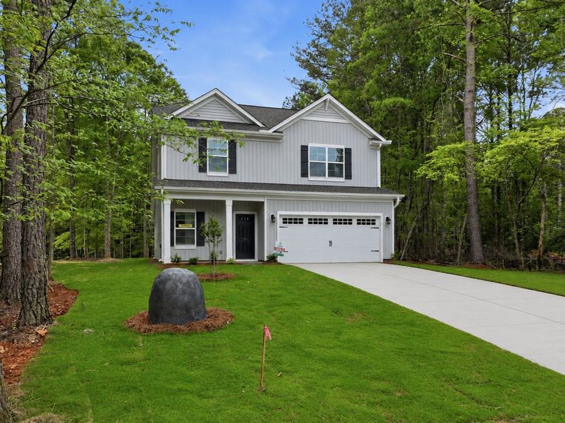 Front exterior of a new home in Broadway Lake, Anderson, SC, highlighting curb appeal (Image 19). Front exterior of a new home in Broadway Lake, Anderson, SC, highlighting curb appeal (Image 19).