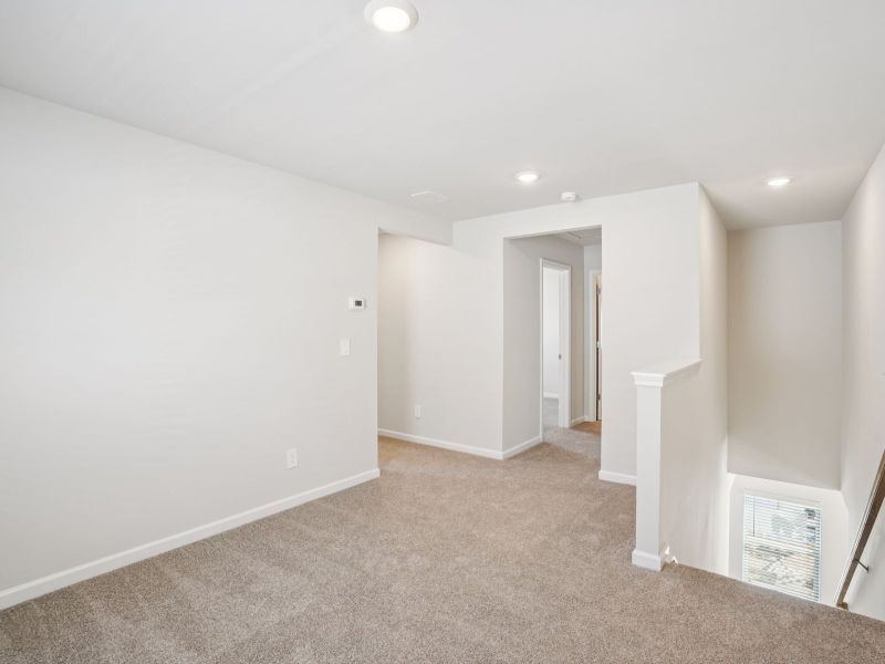 Spacious, unfurnished interior of a new home in Hawthorne Station, Atlanta (Image 21).