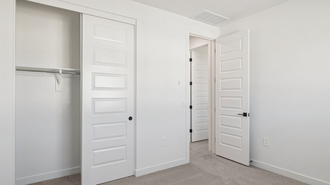 Representative unfurnished interior of a home built from the Crow by D.R. Horton in The Ridge at Stone Butte, Phoenix (Image 43).