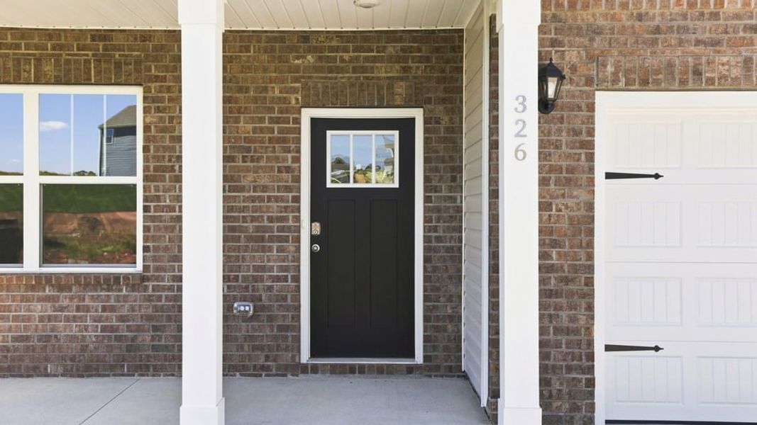 Exterior details and patio area of a home in Spring Ridge, Anderson (Image 3).