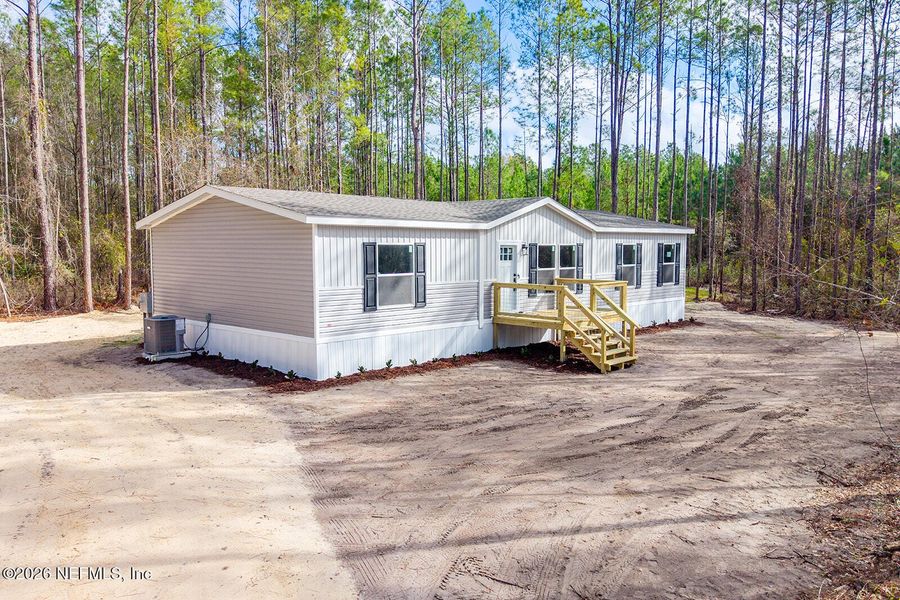 Exterior details and patio area of a home in , Lake Butler (Image 17).