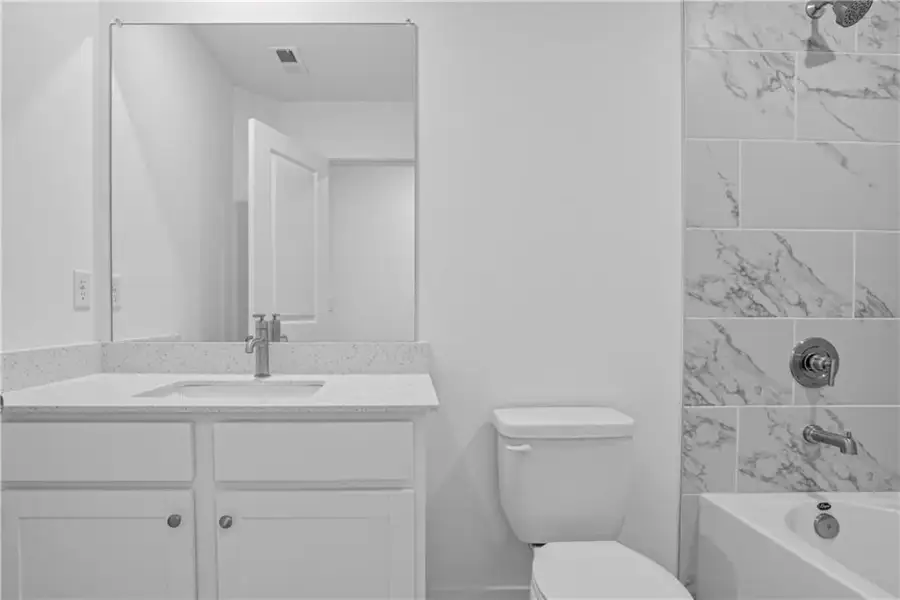 Furnished interior view inside a new home in Towns at Holly Springs, Holly Springs (Image 9).