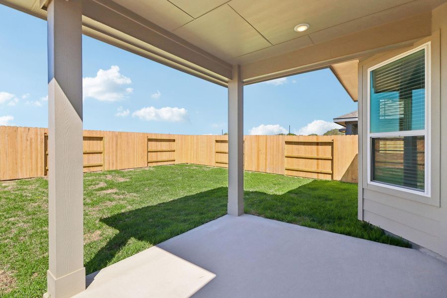 Exterior details and patio area of a home in Sanford Farms - Premier Series, Waller (Image 27).