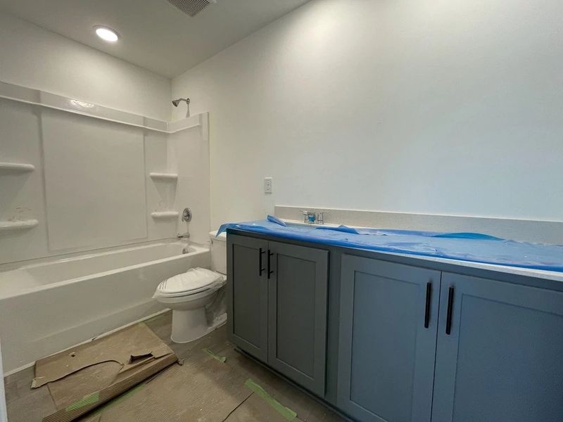 Bath 2 featuring the AW Collection® Minimalist - Strong lines and deep tones define the space. Bath 2 featuring the AW Collection® Minimalist - Strong lines and deep tones define the space.