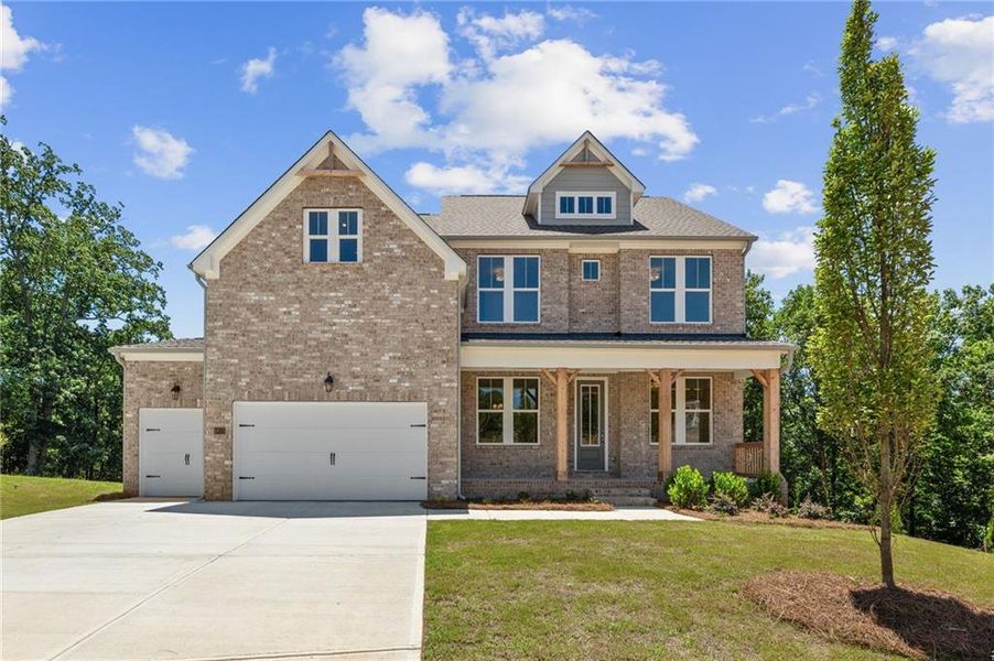 Front exterior of a new home in Melody Lakeside Estates, Buford, GA, highlighting curb appeal (Image 3).