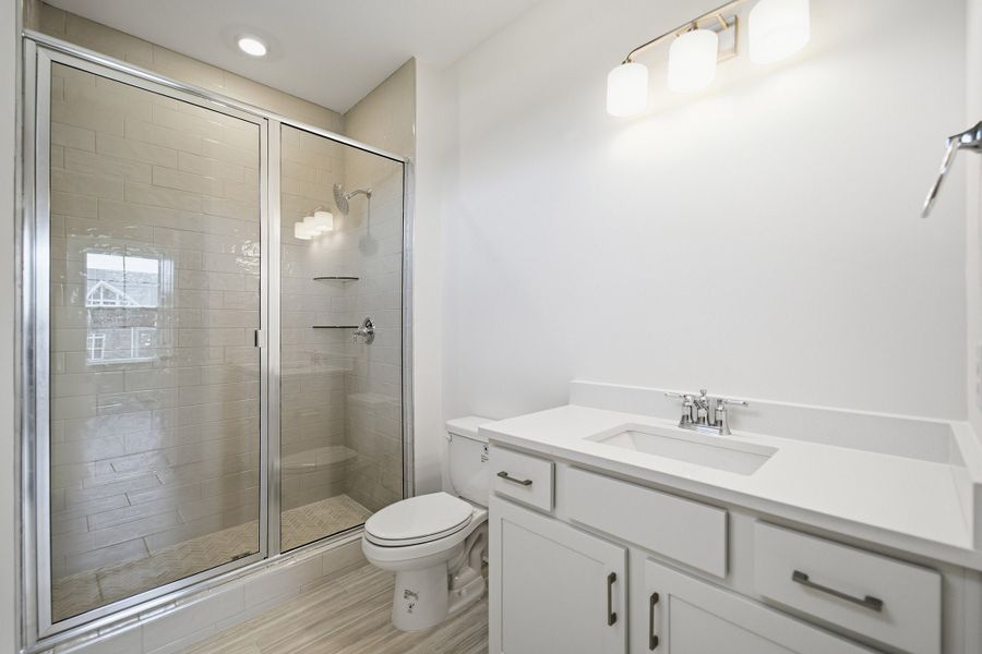Furnished interior view inside a new home in Aden Woods, Fairview (Image 6).