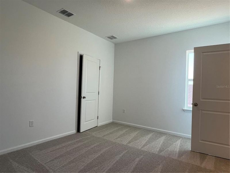Spacious, unfurnished interior of a new home in Hills of Minneola, Minneola (Image 26).
