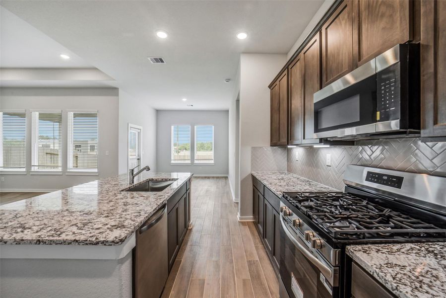 Furnished interior view inside a new home in Windmill Estates, Magnolia (Image 7).
