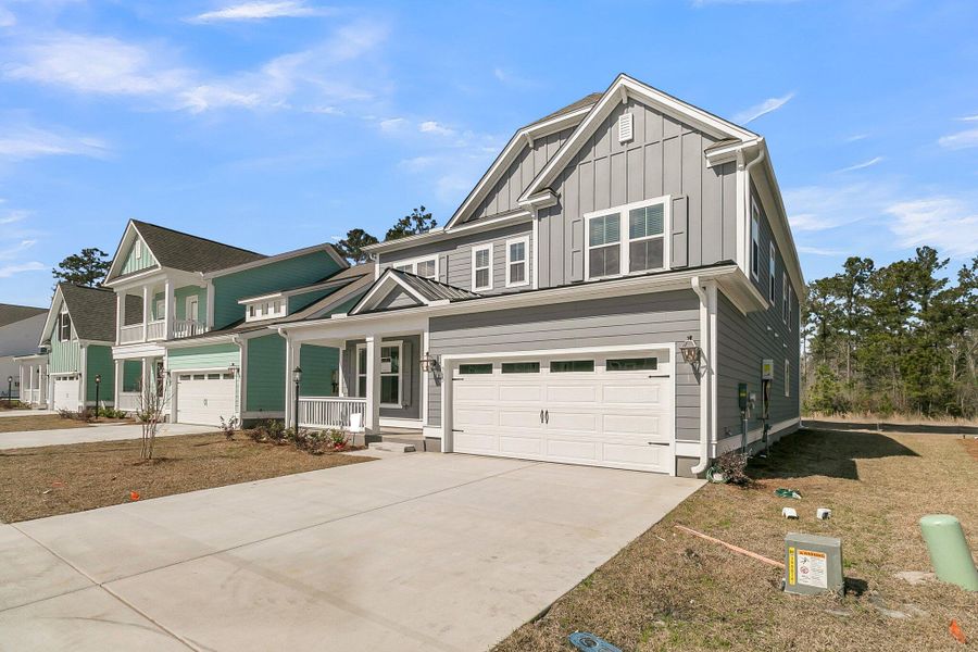 Front exterior of a new home in Cherrywood Estates, Summerville, SC, highlighting curb appeal (Image 24).