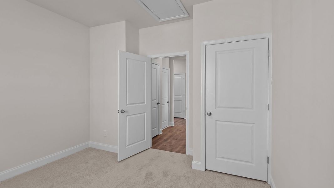 Spacious, unfurnished interior of a new home in Bedford Place, Wilson (Image 15). Spacious, unfurnished interior of a new home in Bedford Place, Wilson (Image 15).