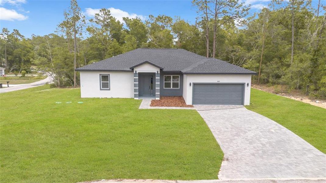 Front exterior of a new home in , Dunnellon, FL, highlighting curb appeal (Image 30).