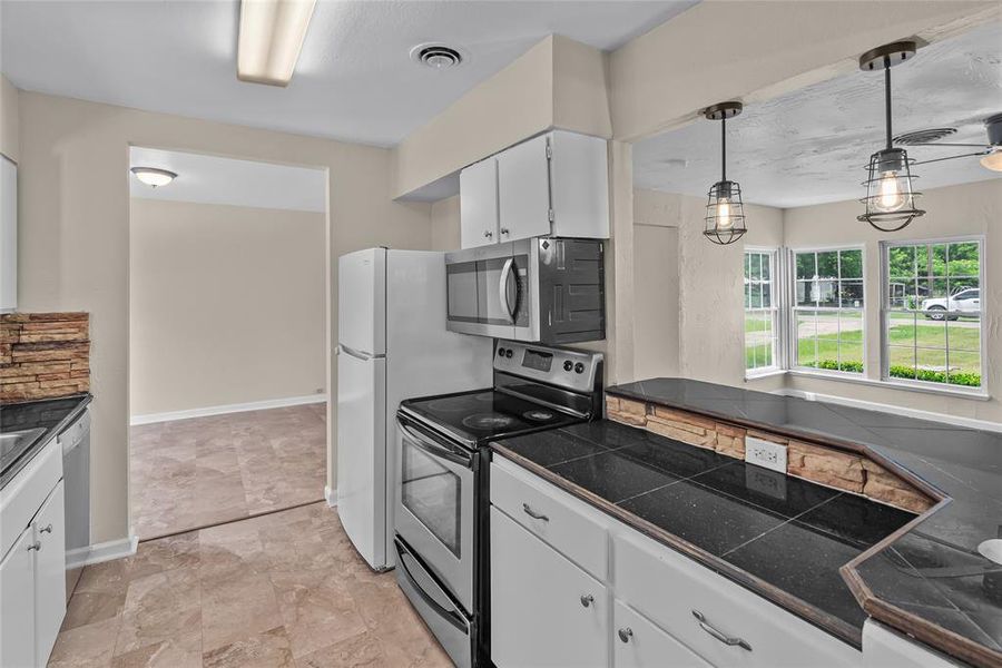 Furnished interior view inside a new home in , Godley (Image 8).