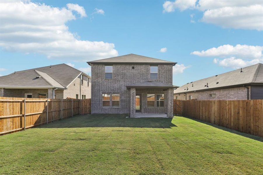 Exterior details and patio area of a home in Simpson Crossing - Spring Series, McKinney (Image 3).