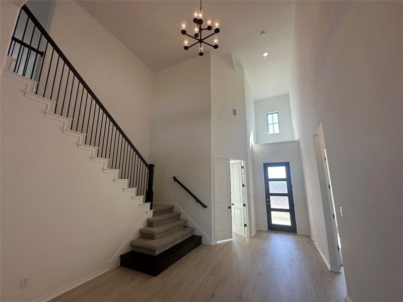 Entry Foyer of Home - soaring ceiling & grand staircase
