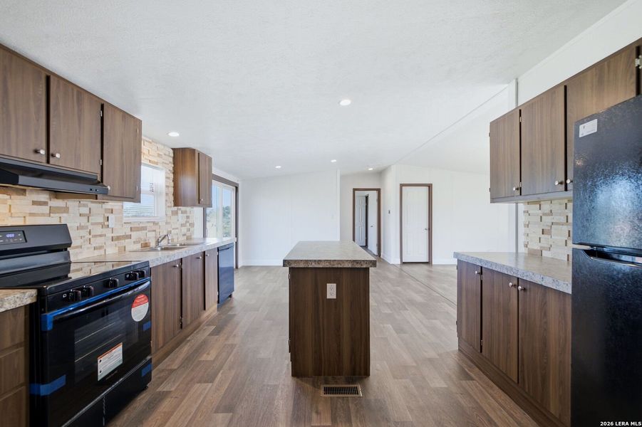 Furnished interior view inside a new home in , Atascosa (Image 4).