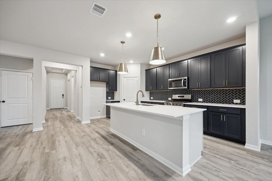 Furnished interior view inside a new home in Elyson, Katy (Image 11).