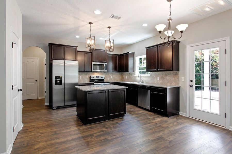 Representative furnished interior of a home built from the The Arcadia by RTS Homes in Doctor's Creek, Ludowici (Image 6).