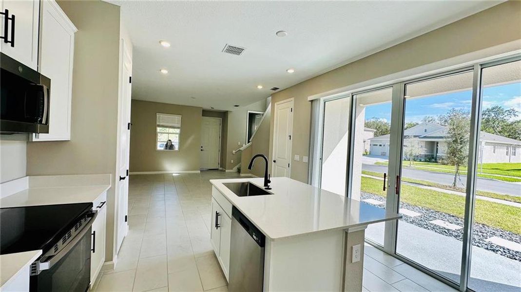 Furnished interior view inside a new home in , Kissimmee (Image 9). Furnished interior view inside a new home in , Kissimmee (Image 9).