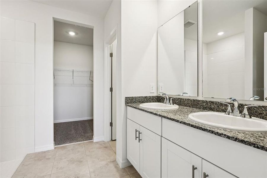 Furnished interior view inside a new home in Lake Deer Estates - Signature Series, Poinciana (Image 9).