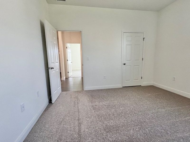 Spacious, unfurnished interior of a new home in Lakes At St Sebastian, Micco (Image 24).