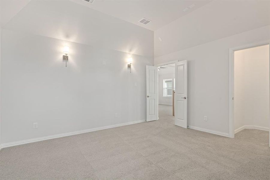 Large media room with walk in closet