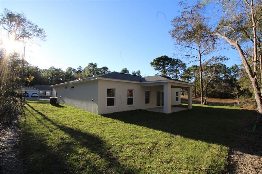 Exterior details and patio area of a home in , Citrus Springs (Image 23).