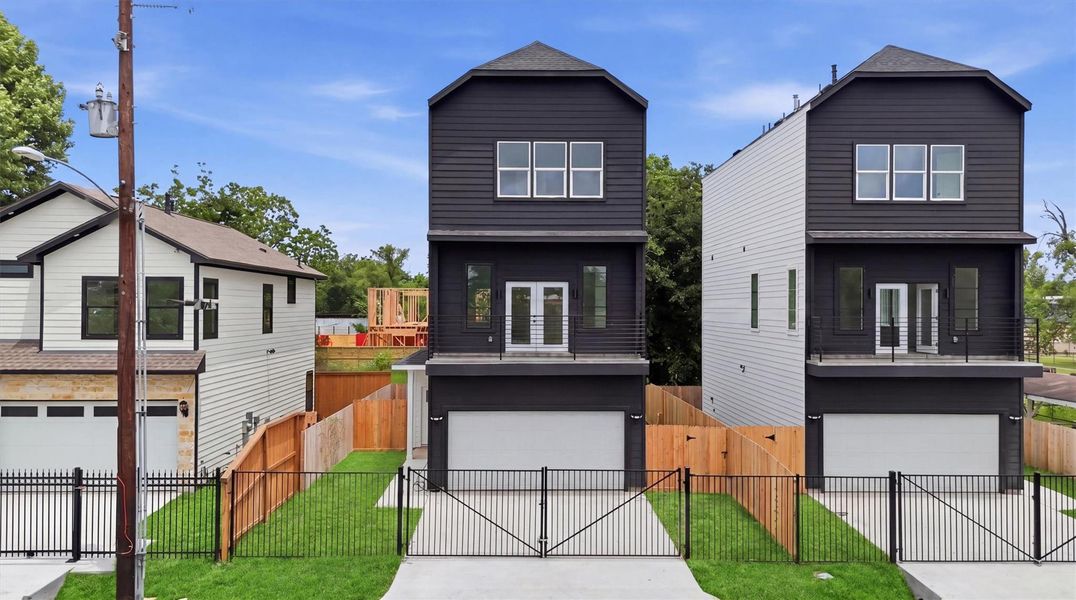 Bold, beautiful, and completely move-in ready. This striking two-tone modern exterior with crisp white and charcoal siding, 2-car garage, and private iron fencing is the fresh start you've been dreaming of. Bold, beautiful, and completely move-in ready. This striking two-tone modern exterior with crisp white and charcoal siding, 2-car garage, and private iron fencing is the fresh start you've been dreaming of.