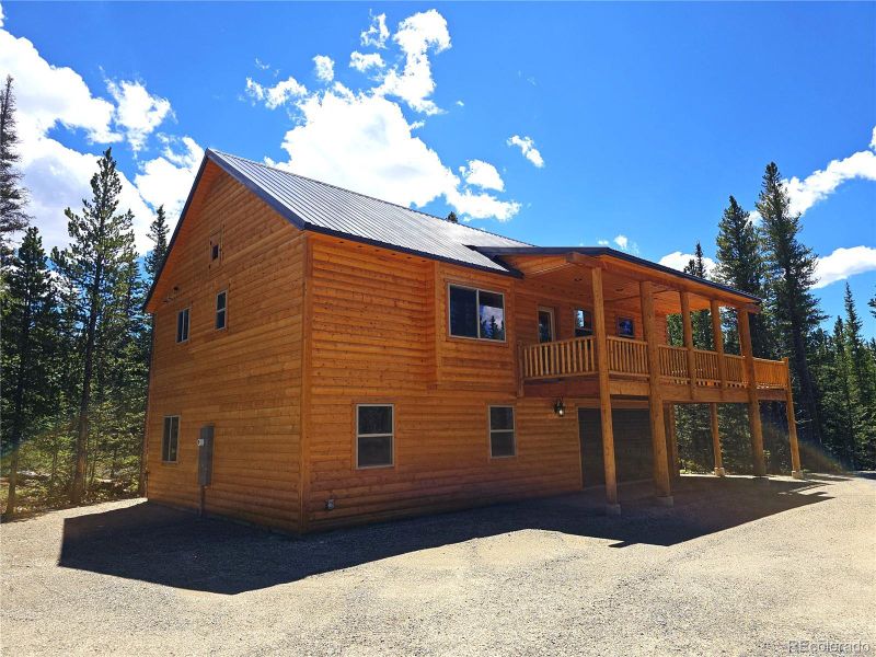 Front exterior of a new home in , Fairplay, CO, highlighting curb appeal (Image 2).