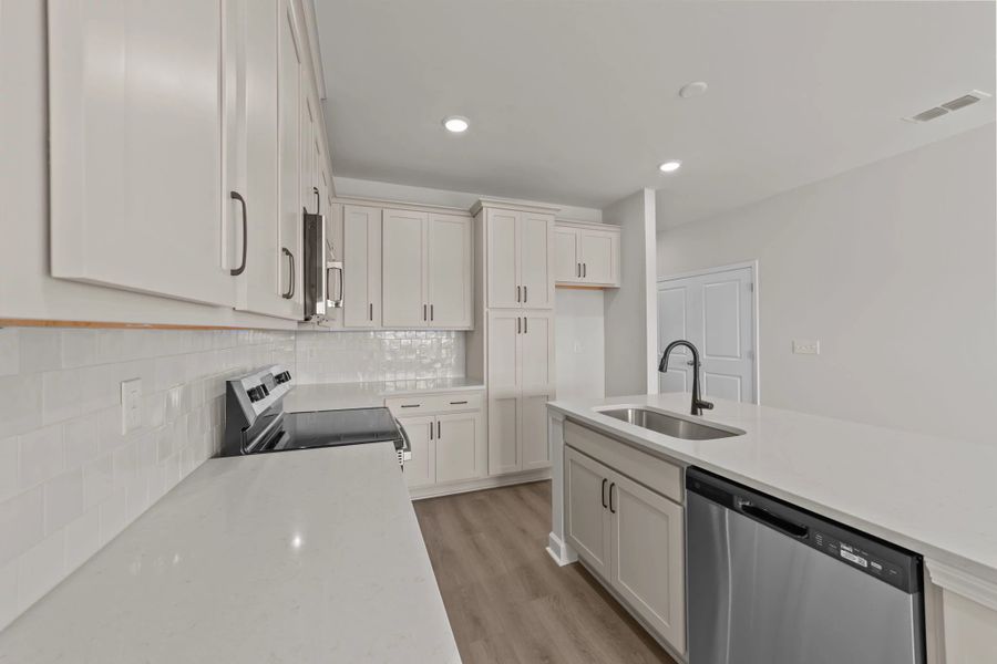 Furnished interior view inside a new home in Blue Heron Retreat, Little River (Image 9).