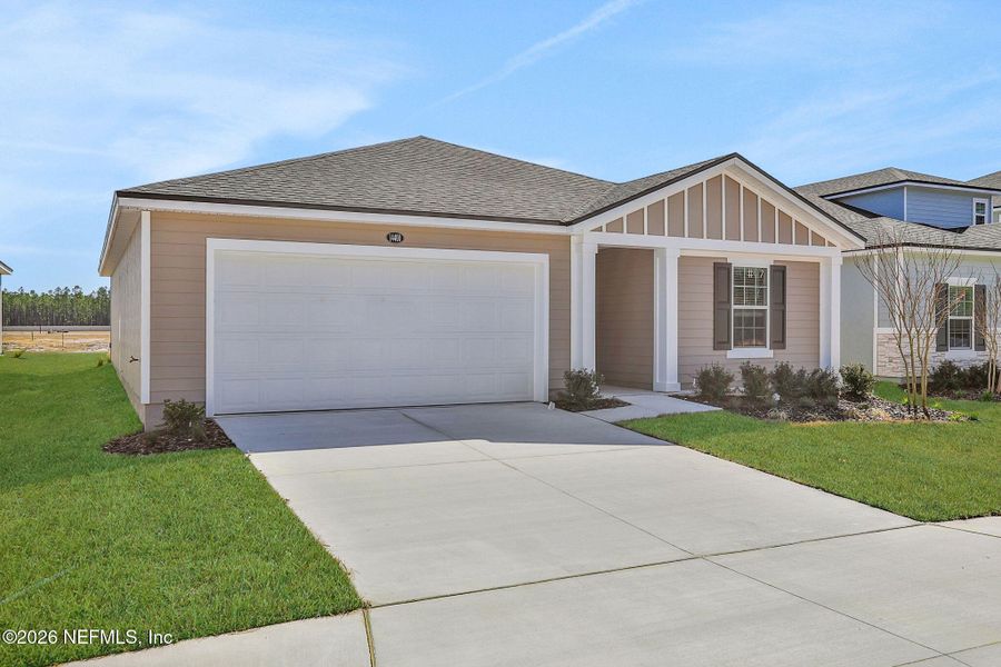 Front exterior of a new home in Bellbrooke, Jacksonville, FL, highlighting curb appeal (Image 19).