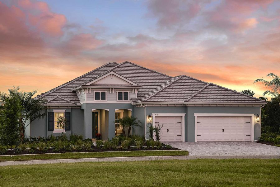 Representative exterior photo of a completed home built from the Savannah 2 by Neal Communities in Windward, Sarasota, FL (Image 2). Representative exterior photo of a completed home built from the Savannah 2 by Neal Communities in Windward, Sarasota, FL (Image 2).