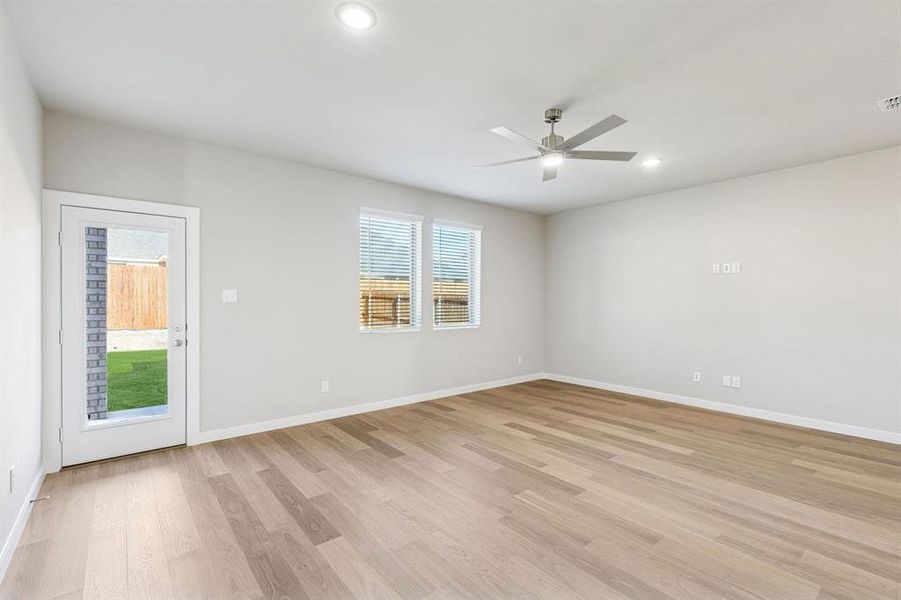 Living Room in the Haylee home plan by Trophy Signature Homes - REPRESENTATIVE PHOTO Living Room in the Haylee home plan by Trophy Signature Homes - REPRESENTATIVE PHOTO