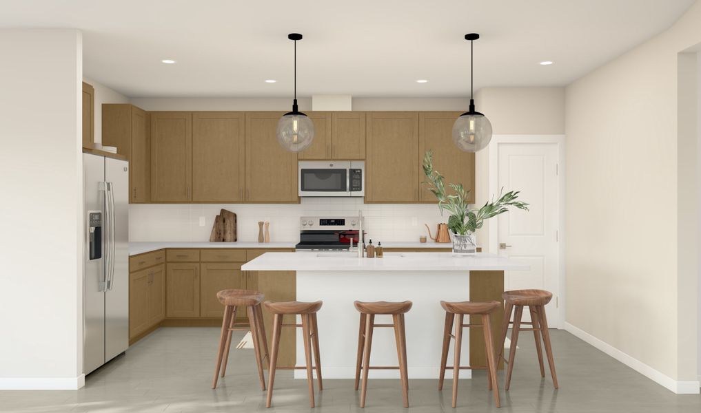 Kitchen with vast island & pendant lights