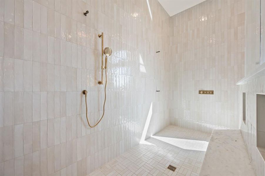Full bathroom with tiled shower