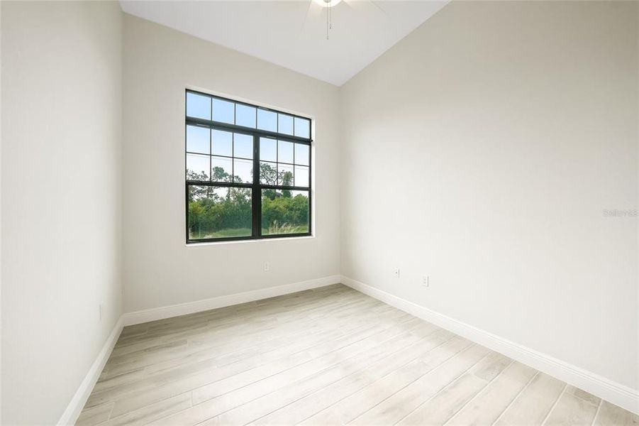 Spacious, unfurnished interior of a new home in , Port Charlotte (Image 37).