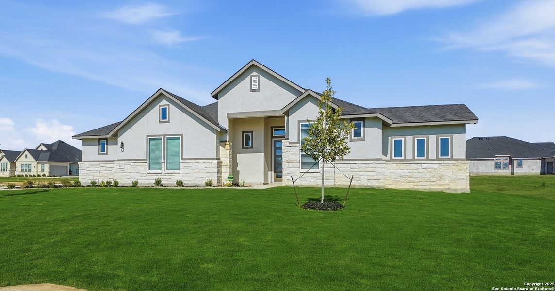 Front exterior of a new home in Sienna Lakes, San Antonio, TX, highlighting curb appeal (Image 1). Front exterior of a new home in Sienna Lakes, San Antonio, TX, highlighting curb appeal (Image 1).